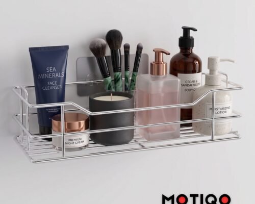 Wall-mounted chrome shower caddy filled with skincare products, lotion dispensers, and makeup brushes