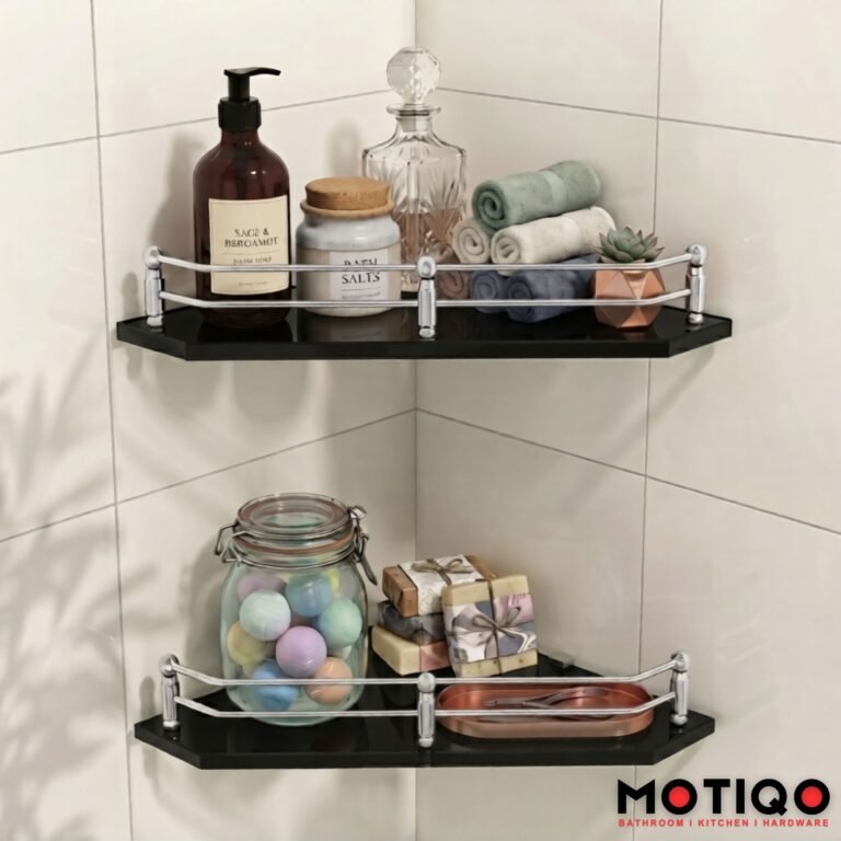 Two black glass corner bathroom shelves with chrome guardrails mounted on a white tile wall